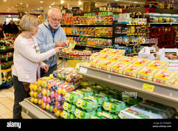 Senior couple shopping in a supermarket, Germany Stock Photo - Alamy
