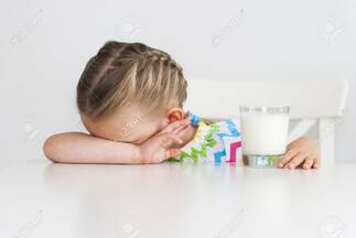 Preschool Little Girl Doesn't Want To Drink Milk, White Background. Stock Photo, Picture And Royalty Free Image. Image 105042081.