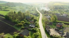Beautiful Ukrainian Village in Western Ukraine in Summertime From Bird's-eye View by procinemastock